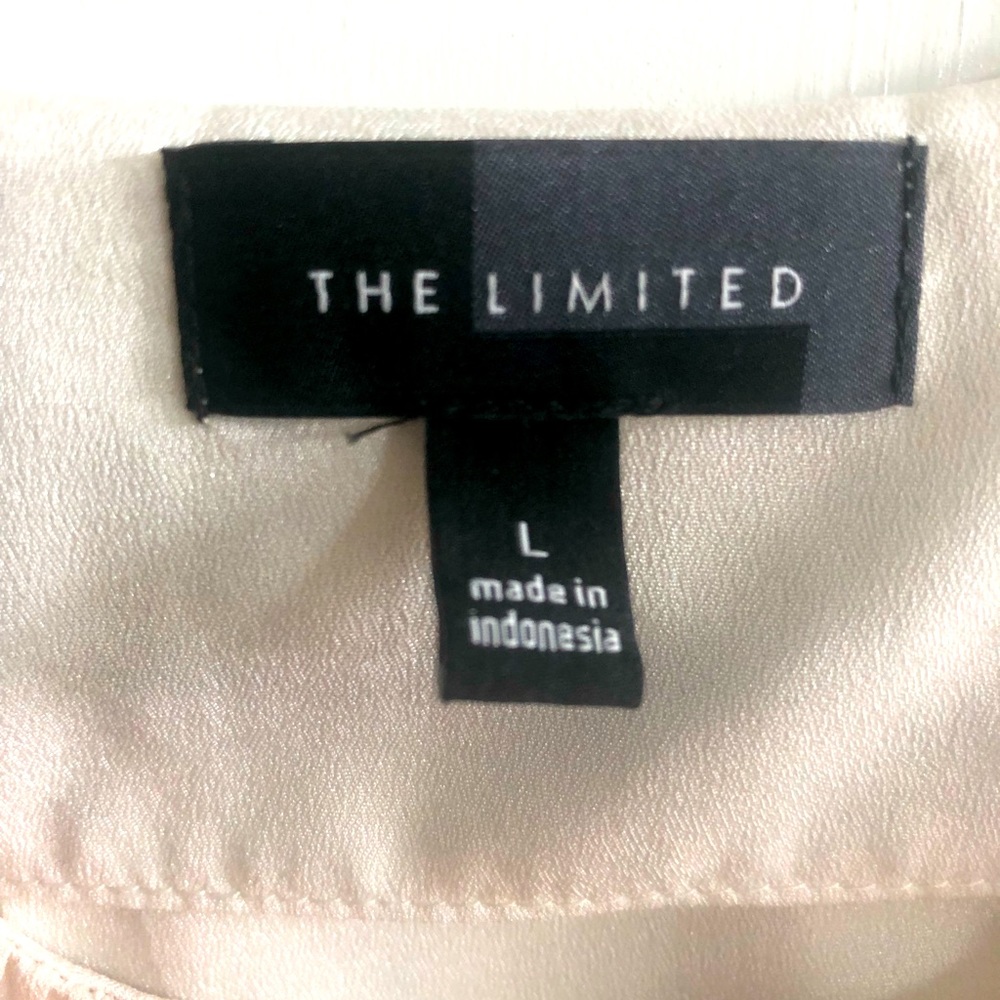 The Limited Women’s Large blouse with gold buckle.